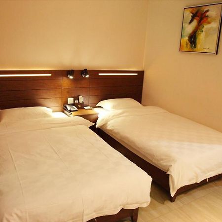 Jin Ya Dian Apartment Hotel Foshan Room photo